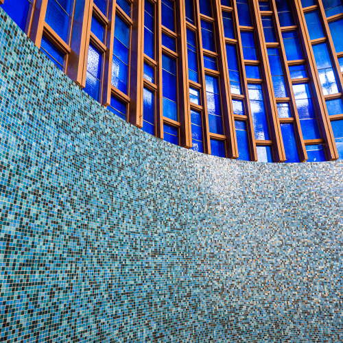 Religiously Detailed Historical Renovation 8-min Feature Wall of glass mosaics with glass filled urethane grout.
